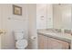 Bathroom with granite vanity, single sink, and updated fixtures at 1220 W Gail Ct, Chandler, AZ 85224