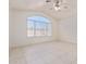 Large bedroom with vaulted ceiling, ceiling fan, and large window at 1220 W Gail Ct, Chandler, AZ 85224