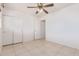 Bedroom with double door closet and ceiling fan at 1220 W Gail Ct, Chandler, AZ 85224