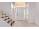 Bright entryway with tile floors and staircase at 1220 W Gail Ct, Chandler, AZ 85224