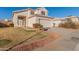 Two-story house with a two-car garage and landscaped front yard at 1220 W Gail Ct, Chandler, AZ 85224