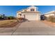 Two-story house with a two-car garage and manicured lawn at 1220 W Gail Ct, Chandler, AZ 85224