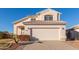 Two-story house with a two-car garage and nicely landscaped front yard at 1220 W Gail Ct, Chandler, AZ 85224