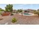 Backyard oasis with pool, pergola, and garden at 12411 N Cantata Ct, Sun City, AZ 85351