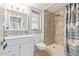 Clean bathroom, featuring a shower and white vanity at 12411 N Cantata Ct, Sun City, AZ 85351