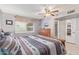 Bright bedroom with a comfortable bed and dresser at 12411 N Cantata Ct, Sun City, AZ 85351