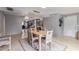 Dining area with wood table and chairs near kitchen at 12411 N Cantata Ct, Sun City, AZ 85351