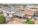 Home exterior with solar panels and a covered patio at 12411 N Cantata Ct, Sun City, AZ 85351