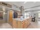 Spacious kitchen with island and stainless steel appliances at 12411 N Cantata Ct, Sun City, AZ 85351