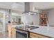 Modern kitchen with stainless steel appliances and island at 12411 N Cantata Ct, Sun City, AZ 85351