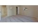 Comfortable bedroom with neutral walls, carpet flooring, and a closet at 13129 W Junipero Dr, Sun City West, AZ 85375