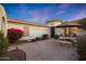 Private courtyard with a table, chairs, and umbrella at 13129 W Junipero Dr, Sun City West, AZ 85375