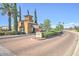 Gated community entrance with guardhouse and brick road at 13129 W Junipero Dr, Sun City West, AZ 85375