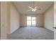 Spacious bedroom with carpet flooring and sliding glass door leading to backyard at 1354 E Brentrup Dr, Tempe, AZ 85283