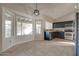 Bright kitchen featuring an abundance of natural light, dark cabinets and stainless steel appliances at 1354 E Brentrup Dr, Tempe, AZ 85283