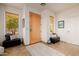 Light and airy entryway with tiled floors and seating at 17022 E Player Ct, Fountain Hills, AZ 85268