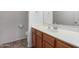 Clean bathroom with wood cabinets and a single sink vanity at 1718 W Colter St # 193, Phoenix, AZ 85015