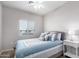 Bedroom with a bed, nightstand and window coverings at 1718 W Colter St # 193, Phoenix, AZ 85015