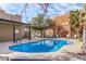 Community pool with covered patio and lounge chairs at 1718 W Colter St # 193, Phoenix, AZ 85015