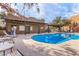 Inviting community pool area with plenty of lounge chairs at 1718 W Colter St # 193, Phoenix, AZ 85015