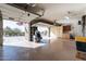 A spacious three-car garage with ample storage cabinets and epoxy flooring at 17844 E Pacana Ct, Gold Canyon, AZ 85118