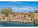 Sparkling pool with water features and desert views at 17844 E Pacana Ct, Gold Canyon, AZ 85118