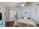 Main bedroom with sliding glass doors leading to a patio at 1801 E Aire Libre Ave, Phoenix, AZ 85022