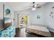 Bedroom with a sliding glass door that opens onto a covered patio at 1801 E Aire Libre Ave, Phoenix, AZ 85022