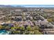 Aerial view of community with surrounding desert landscape at 19550 N Grayhawk Dr # 1107, Scottsdale, AZ 85255