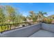 Private balcony overlooking lush green landscape at 19550 N Grayhawk Dr # 1107, Scottsdale, AZ 85255