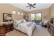 Spacious bedroom with sliding door to balcony at 19550 N Grayhawk Dr # 1107, Scottsdale, AZ 85255