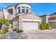 Stunning two-story home with stone accents and a two-car garage at 19550 N Grayhawk Dr # 1107, Scottsdale, AZ 85255