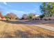 Paved path alongside grassy area and residential homes at 19646 E Reins Rd, Queen Creek, AZ 85142