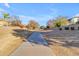 Paved path meanders through a neighborhood with trees at 19646 E Reins Rd, Queen Creek, AZ 85142