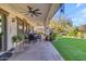 Covered patio with dining area and view of the backyard at 19646 E Reins Rd, Queen Creek, AZ 85142