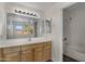 Bathroom boasts a vanity with a large mirror and a shower/tub combo at 19777 N 76Th St # 2292, Scottsdale, AZ 85255