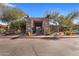 Inviting community entrance with stone accents and landscaping at 19777 N 76Th St # 2292, Scottsdale, AZ 85255