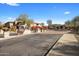 Community entrance sign and gate showcasing desert landscaping and a secure, gated entry to the neighborhood at 19777 N 76Th St # 2292, Scottsdale, AZ 85255