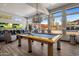 Community room features a pool table and comfortable seating area at 19777 N 76Th St # 2292, Scottsdale, AZ 85255