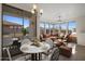 Bright living area featuring an open floor plan, a cozy seating arrangement and access to outdoor views at 19777 N 76Th St # 2292, Scottsdale, AZ 85255
