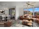 Stylish living room with dining area, outdoor views and ample space for relaxation and entertaining at 19777 N 76Th St # 2292, Scottsdale, AZ 85255