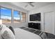 Bright main bedroom with scenic views from large windows and comfortable decor at 19777 N 76Th St # 2292, Scottsdale, AZ 85255