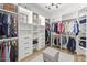 Large walk-in closet with ample shelving and hanging space at 20684 E Natalie Way, Queen Creek, AZ 85142