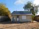 Back of the house, showing damaged wood siding at 2206 N 11Th St, Phoenix, AZ 85006