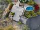 Stunning aerial view showcasing the home's unique layout and pool at 2235 E Vista Ave, Phoenix, AZ 85020