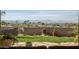 Landscaped backyard with a view of the city skyline and mountains at 2235 E Vista Ave, Phoenix, AZ 85020