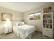 Bright bedroom with bookshelf and window at 2235 E Vista Ave, Phoenix, AZ 85020