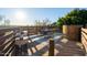 Deck with seating area, hot tub, and city views at 2235 E Vista Ave, Phoenix, AZ 85020