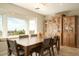 Dining room features a large wooden table and built-in hutch at 2235 E Vista Ave, Phoenix, AZ 85020