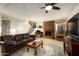 Living room with fireplace, leather sofa and a sauna at 2235 E Vista Ave, Phoenix, AZ 85020